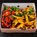 Salt & Pepper Tikka Box on a near-black background – Ben’s Fire & Feast